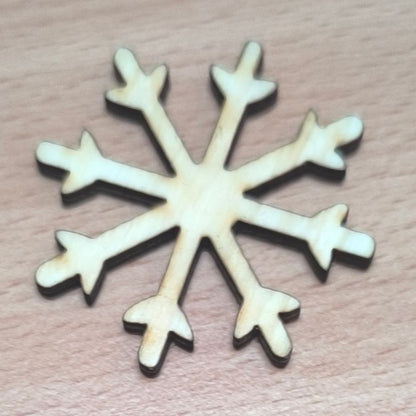 Vyřezávaná vánoční ozdoba (různé motivy)